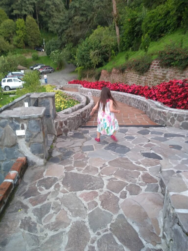 child running down a path freely 